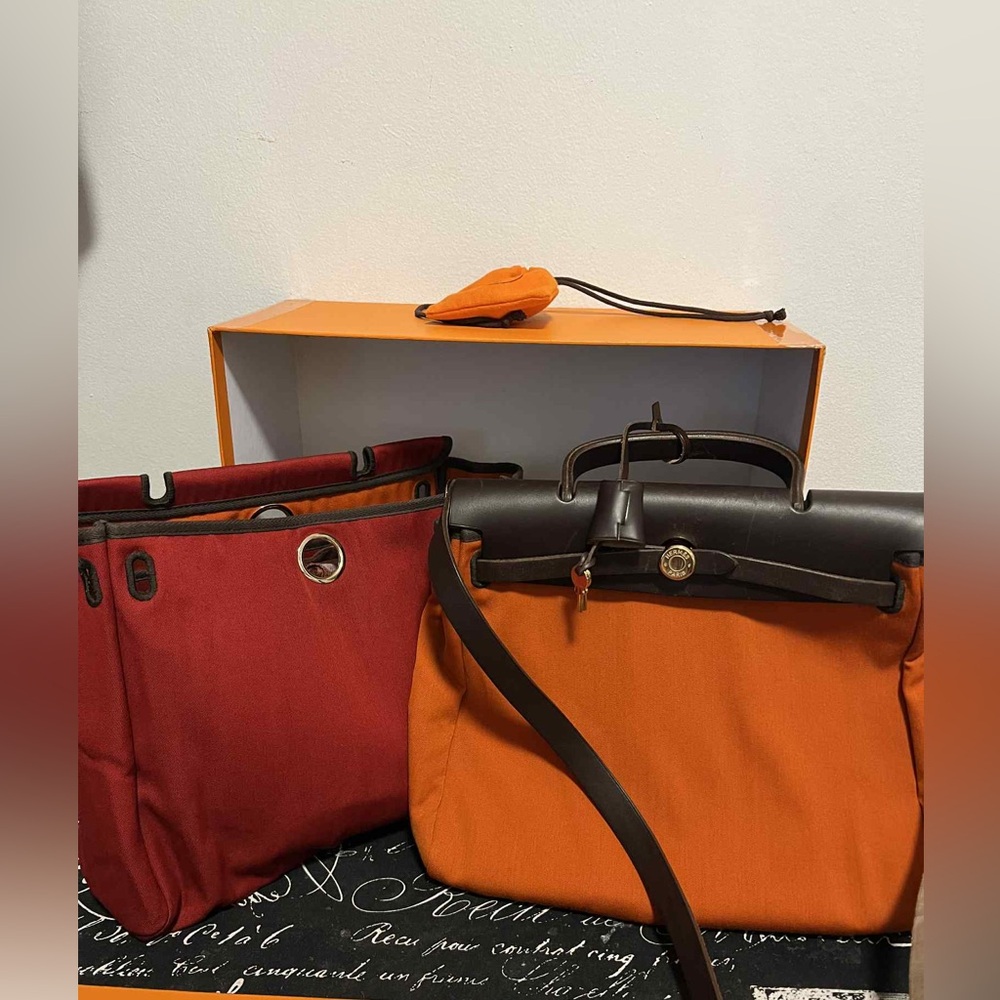 Hermes’ Leather Herbag

Orange and Red Handbags